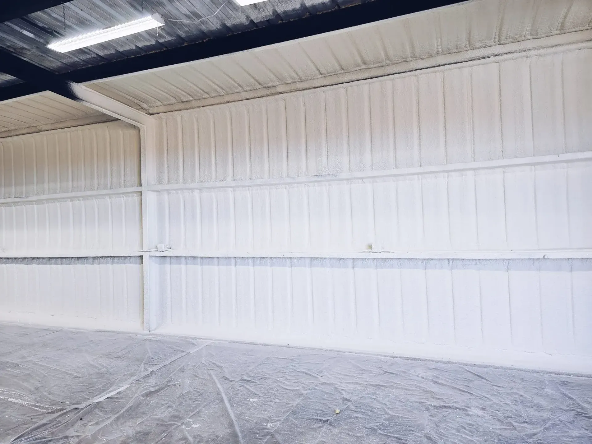 Closed cell spray foam inside a West Texas metal building